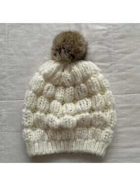 D.i.a. White chunky knit beanie with brown rabbit fur pom pom